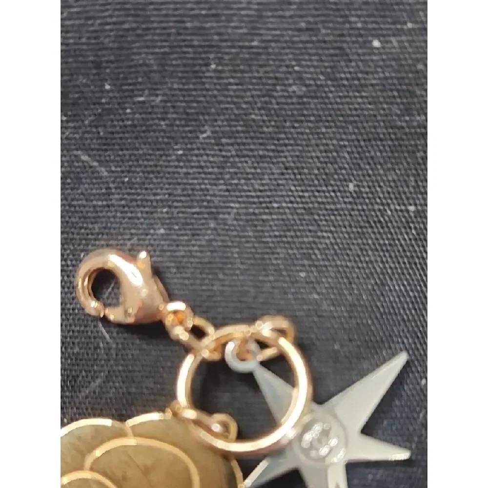 2025 Holiday Chanel Gold Floral and Star Charm NWOT